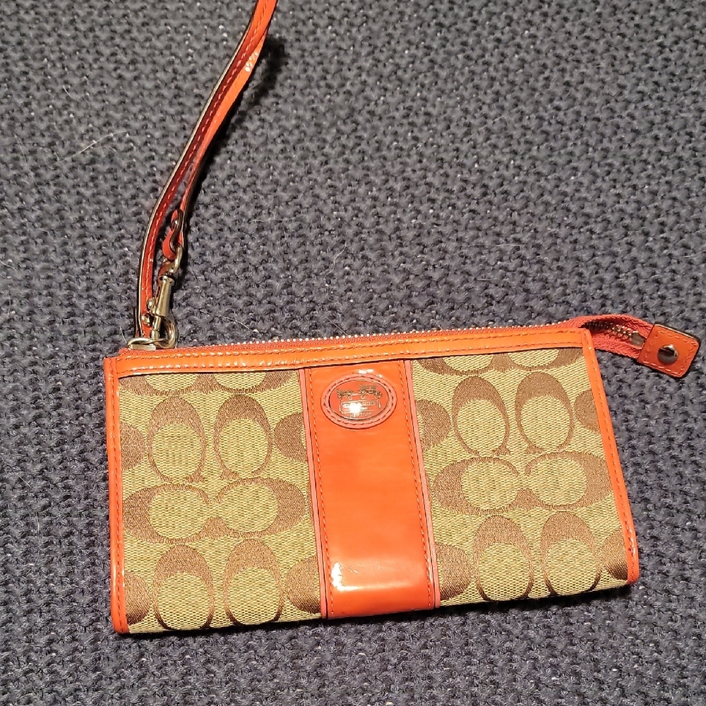 Coach Brown and Orange Clutch with Signature Monogram